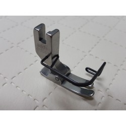 Presser foot with needle...